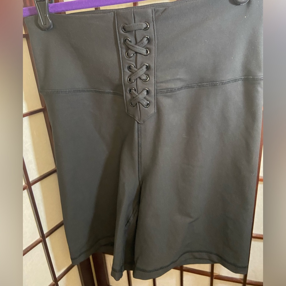 NWOT weworewhat solid black lace up biker shorts size Medium.